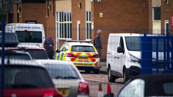 Emergency services at Tewkesbury School in Gloucesershire, which has been locked down after a teenage boy was arrested following reports a pupil stabbed a teacher. Picture date: Mo<em></em>nday July 10, 2023.