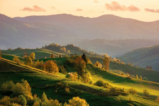 mountainous countryside at sunset