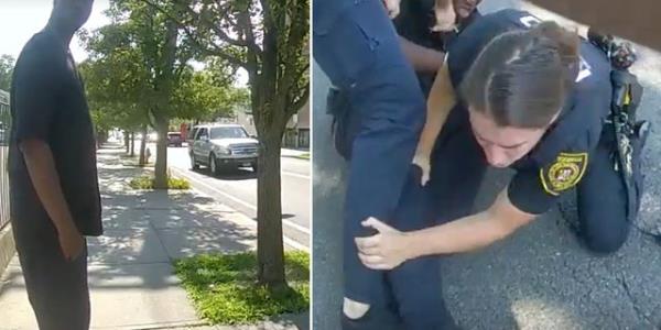 A man stands on a sidewalk, left, police tussle with a man on the ground, right.