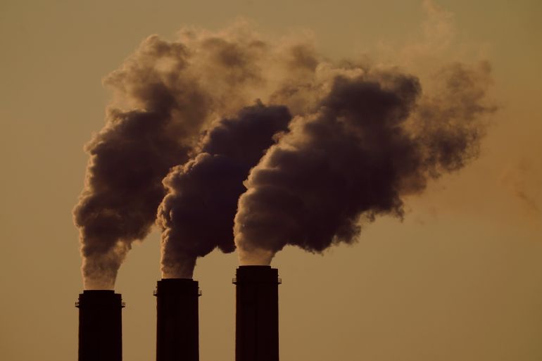 Emissions rise from the smokestacks at the Jeffrey Energy Center coal power plant in Kansas.