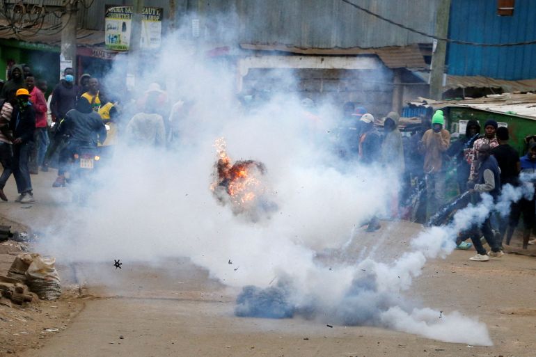 A teargas canister, lobbed by riot police officers to disperse protesters, explodes as supporters of Kenya's opposition leader Raila Odinga participate in anti-government protests against the imposition of tax hikes by the government in Kibera settlement of Nairobi, Kenya July 12, 2023 