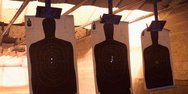 human silhouettes at gun range