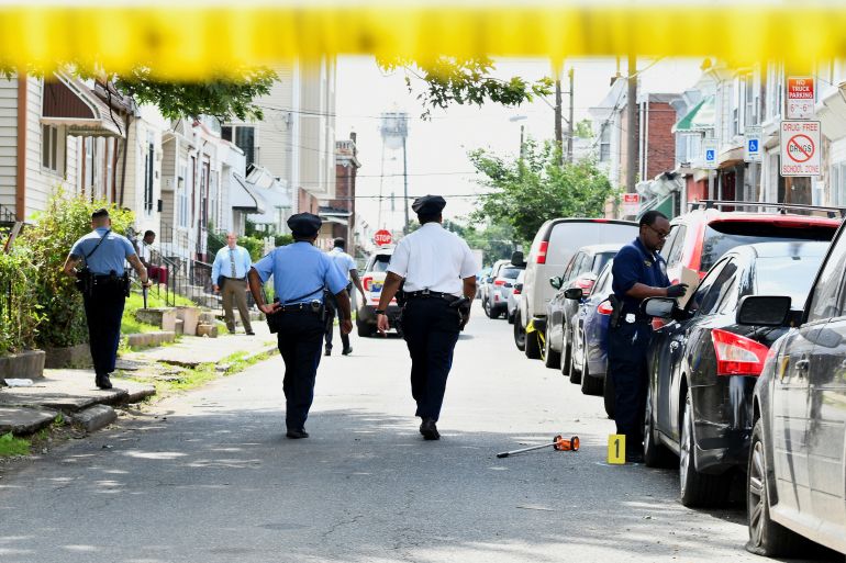 Police officers walking down street