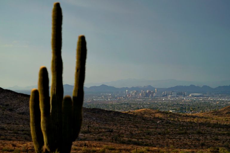 The sun sets over Phoenix, Arizona