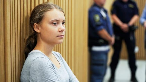 Climate activist Greta Thunberg of Sweden waits for a hearing in a court in Malmo, Sweden, Monday, July 24, 2023. Thunberg appeared in court on Mo<em></em>nday charged with disobeying law enforcement in co<em></em>nnection with a protest in Malmo in southern Sweden last month. (AP Photo/Pavel Golovkin)