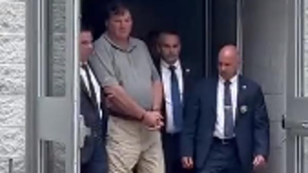 Rex Heuermann (centre left) was charged with three murders. Pic: NBC