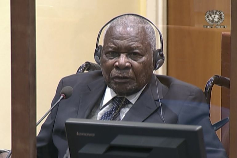 This screengrab taken from handout video footage released by The Mechanism for Internatio<em></em>nal Criminal Tribunals (MICT) on September 29, 2022, shows Felicien Kabuga, an alleged financier of the 1994 genocide in Rwanda, at a hearing in The Hague, on August 18, 2022, wher<em></em>e he is facing charges of genocide and crimes against humanity. - Rwandan tycoon Felicien Kabuga played a "substantial" role in the 1994 genocide that shocked the world, prosecutors said at the opening of his trial in The Hague. o<em></em>nce one of Rwanda's richest men, the 87-year-old Kabuga used his vast wealth to set up hate media that urged ethnic Hutus to kill rival Tutsi "snakes" and supplied the murderous Interahamwe militia with machetes, the prosecution said. (Photo by Handout / MICT / AFP) / RESTRICTED TO EDITORIAL USE - MANDATORY CREDIT "AFP PHOTO/MICT" - NO MARKETING NO ADVERTISING CAMPAIGNS - DISTRIBUTED AS A SERVICE TO CLIENTS - RESTRICTED TO EDITORIAL USE - MANDATORY CREDIT "AFP PHOTO/MICT" - NO MARKETING NO ADVERTISING CAMPAIGNS - DISTRIBUTED AS A SERVICE TO CLIENTS /