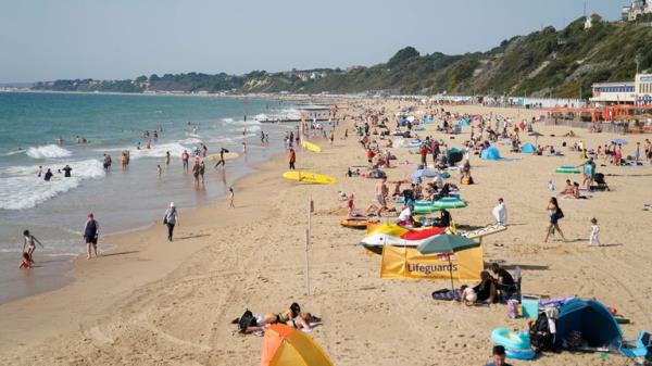 People enjoying the warm weather on Bournemouth beach in Dorset, as forecasters are predicting a &#34;last dose of summer&#34;, with warm spells reaching 30C on Tuesday in southern areas of England and 32C on Wednesday and Thursday in central and southern England. Picture date: Tuesday September 5, 2023.