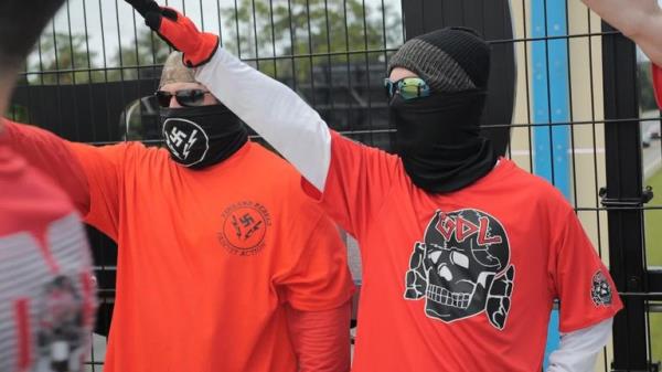 On a motorway overpass, on the edge of Orlando, there was a gathering of around 50 neo-Nazis. They were members of two anti-Semitic, white natio<em></em>nalist groups - "Blood Tribe" and the "Goyim Defense League."