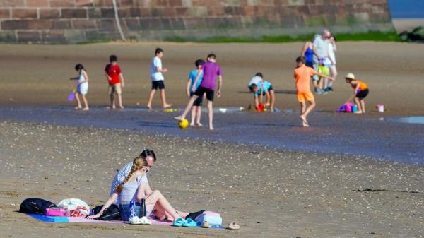 People on the beach at New Brighton. Picture date: Mo<em></em>nday September 4, 2023.