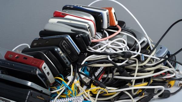 Most motorists have a tangle of phone chargers to co<em></em>nnect their devices (Getty)