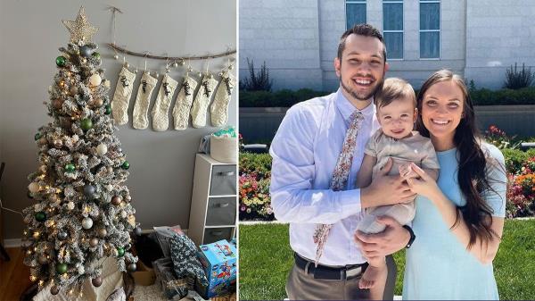 Christmas tree next to a couple smiling and holding their son.