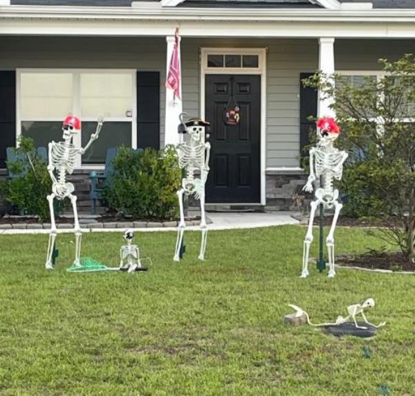 The Blakefield Bo<em></em>nes change position and outfits to keep neighbors delighted through the Halloween season.