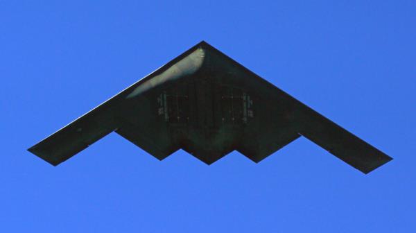 Underside of flying B-2 bomber