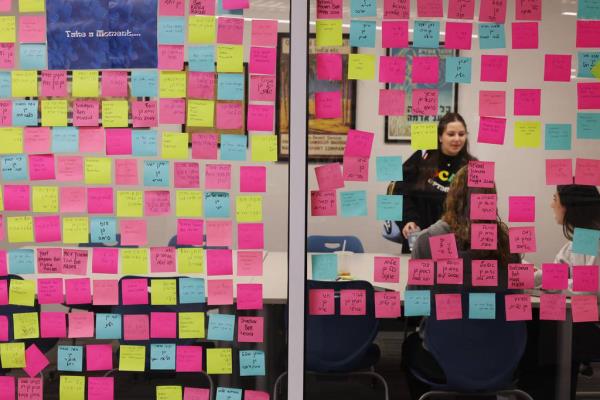 The names of more than 400 family members fighting for the Israeli army are written on Post-it notes at Ida Crown Jewish Academy in Skokie on Oct. 27, 2023. The notes serve as a reminder to students to pray for the family members fighting in the Israel-Hamas war. 