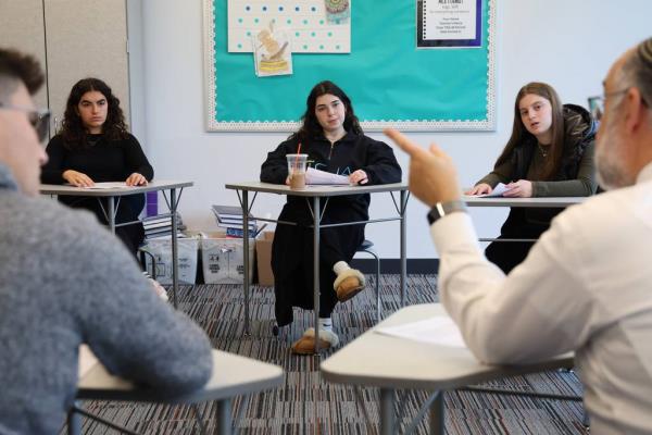 Rabbi Leo<em></em>nard A. Matanky, right, leads a discussion group on Oct. 27, 2023, with students at Ida Crown Jewish Academy in Skokie a<em></em>bout the Israel-Hamas war.