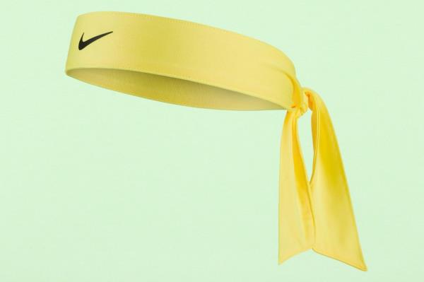 Fresh green paper texture background with a yellow headband featuring a black swoosh on top.