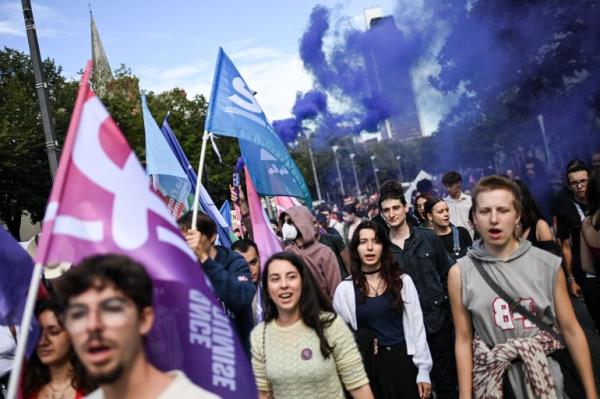 Protesters gather to denounce French President Emmanuel Macron