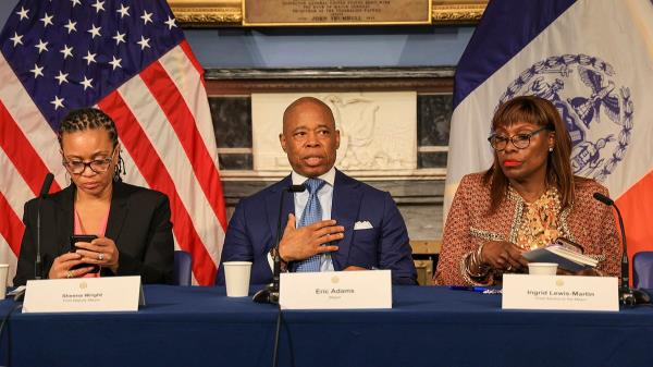 Mayor Eric Adams flanked by his Deputy Mayor Sheena Wrigh<em></em>t (L) and Ingrid Lewis-Martin are pictured during his weekly in person press co<em></em>nference at City Hall Blue Room. (Luiz C. Ribeiro/New York Daily News/Tribune News Service via Getty Images)