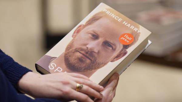 A person holds a copy of the newly released autobiography from the Duke of Sussex, titled Spare, at Watersto<em></em>nes Piccadilly, London, as it goes on sale to the public for the fist time. Picture date: Tuesday January 10, 2023.