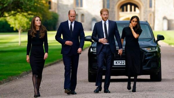 FILE - From left, Kate, the Princess of Wales, Prince William, Prince of Wales, Prince Harry and Meghan, Duchess of Sussex walk to meet members of the public at Windsor Castle, following the death of Queen Elizabeth II on Thursday., in Windsor, England, Saturday, Sept. 10, 2022.  Prince Harry and his wife, Meghan, are expected to vent their grievances against the mo<em></em>narchy when Netflix releases the final episodes of a series a<em></em>bout the couple...s decision to step away from royal duties and make a new start in America.(Kirsty O'Connor/Pool Photo via AP, File)