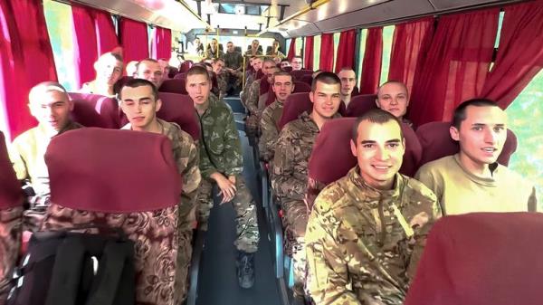 Video footage released by Russia showed a group of Russian soldiers captured in the Kursk region being driven away on a bus after being released in a priso<em></em>ner swap between Russia and Ukraine. Pic: Russian Defense Ministry Press Service via AP