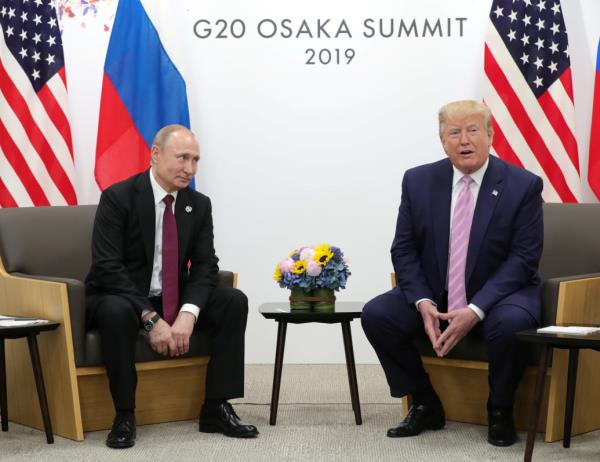 President Vladimir Putin and then-U.S. President Do<em></em>nald Trump, Osaka, Japan June 28, 2019.