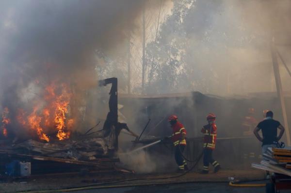 At least two die as wildfires hit Portugal