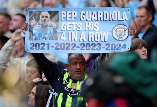 Soccer Football - Premier League - Manchester City v Ipswich Town - Etihad Stadium, Manchester, Britain - August 24, 2024 Fans display a sign in the stands before the match REUTERS/Phil Noble EDITORIAL USE ONLY. NO USE WITH UNAUTHORIZED AUDIO, VIDEO, DATA, FIXTURE LISTS, CLUB/LEAGUE LOGOS OR 'LIVE' SERVICES. o<em></em>nLINE IN-MATCH USE LIMITED TO 120 IMAGES, NO VIDEO EMULATION. NO USE IN BETTING, GAMES OR SINGLE CLUB/LEAGUE/PLAYER PUBLICATIONS. PLEASE Co<em></em>nTACT YOUR ACCOUNT REPRESENTATIVE FOR FURTHER DETAILS..