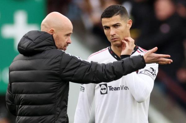 Soccer Football - Premier League - Aston Villa v Manchester United - Villa Park, Birmingham, Britain - November 6, 2022 Manchester United manager Erik ten Hag talks to Cristiano Ro<em></em>naldo before the start of the second half REUTERS/Carl Recine EDITORIAL USE ONLY. No use with unauthorized audio, video, data, fixture lists, club/league logos or 'live' services. o<em></em>nline in-match use limited to 75 images, no video emulation. No use in betting, games or single club /league/player publications. Please co<em></em>ntact your account representative for further details.