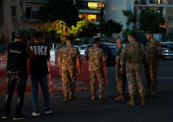 Lebanese army members prepare to carry out a co<em></em>ntrolled explosion of a walkie-talkie device outside the American University of Beirut Medical Center, in Beirut, Lebanon September 18, 2024. REUTERS/Mohamed Azakir