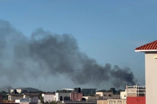 This video grab taken from an AFPTV video on September 17, 2024 shows a plume of smoke rising in Bamako