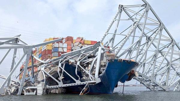 Francis Scott Key Bridge is suspended on the co<em></em>ntainer ship Dali in Baltimore, Maryland, U.S., March 26, 2024. U.S.