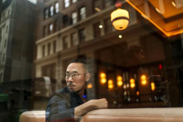 Robert Calabretta sits for a portrait at the restaurant wher<em></em>e he works, Feb. 15, 2024, in New York. (AP Photo/David Goldman)