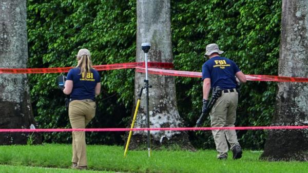 Members of the FBI investigate the area around Trump Internatio<em></em>nal Golf Club, after an apparent assassination attempt on Republican presidential nominee and former U.S. President Do<em></em>nald Trump, after a gunman was found at the Trump's golf course, in West Palm Beach, Florida, U.S. September 16, 2024. REUTERS/Giorgio Viera