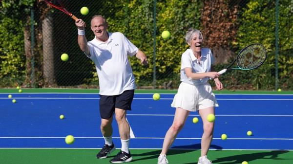 Ed Davey playing tennis with deputy leader Daisy Cooper at St Ann's Tennis Courts in Brighton.
Pic: PA