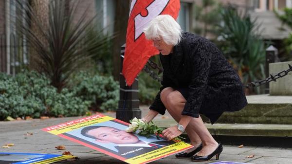 Melanie Leahy, whose 20-year-old son, Matthew, died in November 2012 while a patient at the Linden Centre mental health facility in Chelmsford, lays some flowers and a picture of him outside the Lampard Inquiry.
Pic: PA