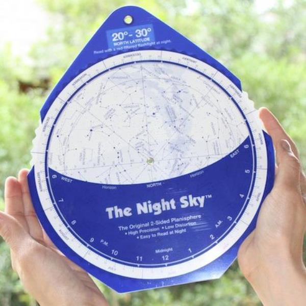 Blue and white disk with stars and co<em></em>nstellations printed on it.