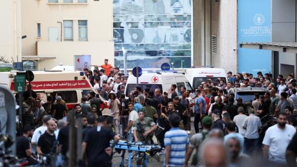 People gather outside a hospital, as more than 1,000 people, including Hezbollah fighters and medics, were wounded on Tuesday when the pagers they use to communicate exploded across Lebanon, according to a security source, in Beirut