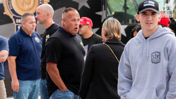 Members of the Suffolk County PBA attend a tailgate ahead of former President Do<em></em>nald Trump’s rally in Unio<em></em>ndale, New York