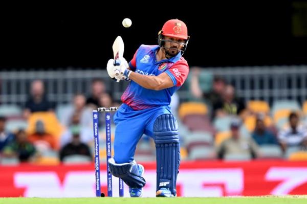 BRISBANE, AUSTRALIA - NOVEMBER 01: Gulbadin Naib of Afghanistan ducks a bouncer during the ICC Men's T20 World Cup match between Afghanistan and Sri Lanka at The Gabba on November 01, 2022 in Brisbane, Australia. (Photo by Bradley Kanaris/Getty Images)