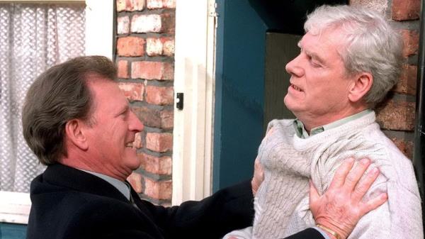 Johnny Briggs and  Geoff Hinsliff. Pic: ITV/Shutterstock
