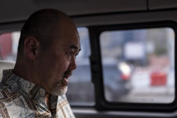 A teardro<em></em>p rolls down the cheek of Kenneth Barthel, who was adopted from South Korea at the age of six, as he sits in a minivan in Busan, South Korea, Friday, May 17, 2024, after spending the day trying to uncover the details of his early life and find his birth family. (AP Photo/Jae C. Hong)