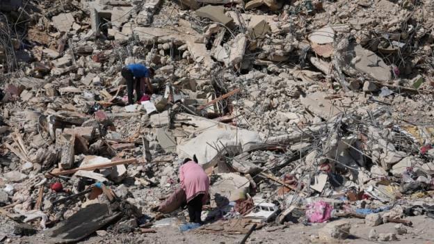 The ruins of buildings destroyed in an Israeli airstrike on Ain el Delb