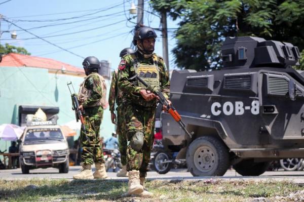 Kenyan police officers patrol Haiti