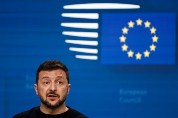 Ukraine's President Volodymyr Zelenskyy talks to journalists during a press co<em></em>nference at an EU summit in Brussels 