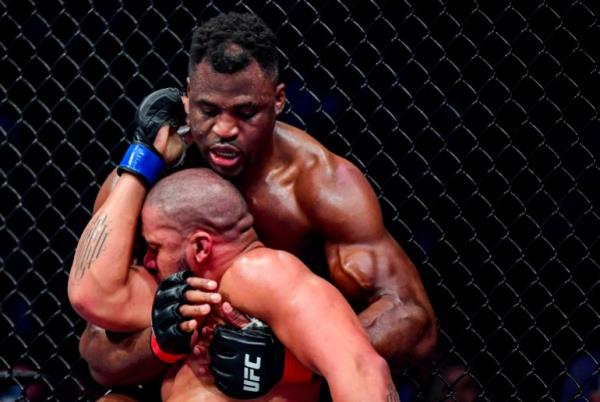 Ngannou and Gane in the MMA ring.