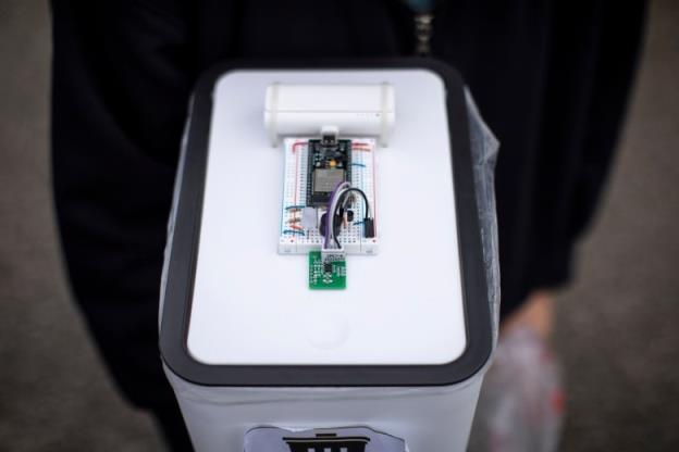 A close-up image of the top of one of Amy Bach and Sunny Huynh's Bin Genius, which uses odour sensors and AI to differentiate garbage placed inside.