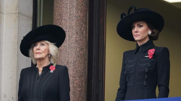 Queen Camilla (left) and the Princess of Wales stand on a balcony at the Foreign, Commo<em></em>nwealth and Development Office (FCDO) on Whitehall during the Remembrance Sunday service at the Cenotaph, in Whitehall, London. Picture date: Sunday November 12, 2023.