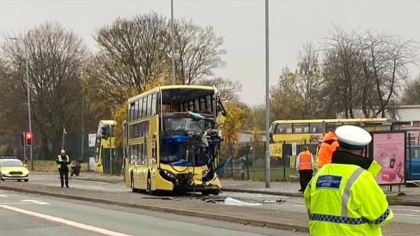 At least 17 people have been taken to hospital after a crash involving two double-decker buses in Manchester.
